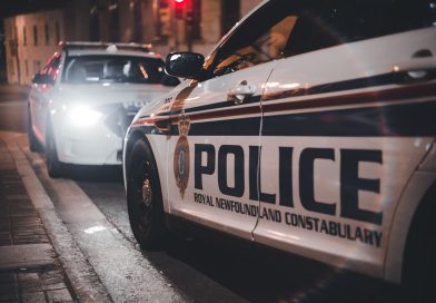 police car patrol city street